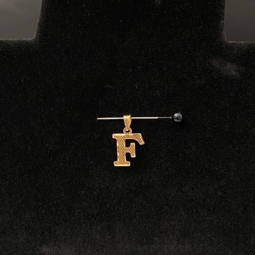 حرف ذهب عيار 18 حرف F بوزن 0.21 جرام | قمة زاوية الشفاء للذهب والمجوهرات